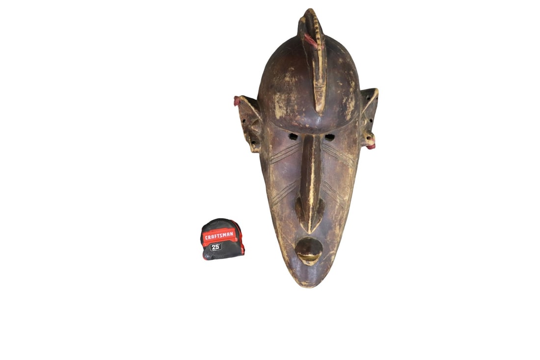CARVED WOOD HEAD: Carved wood. 20" h x 10" w x 12 1/2" d.