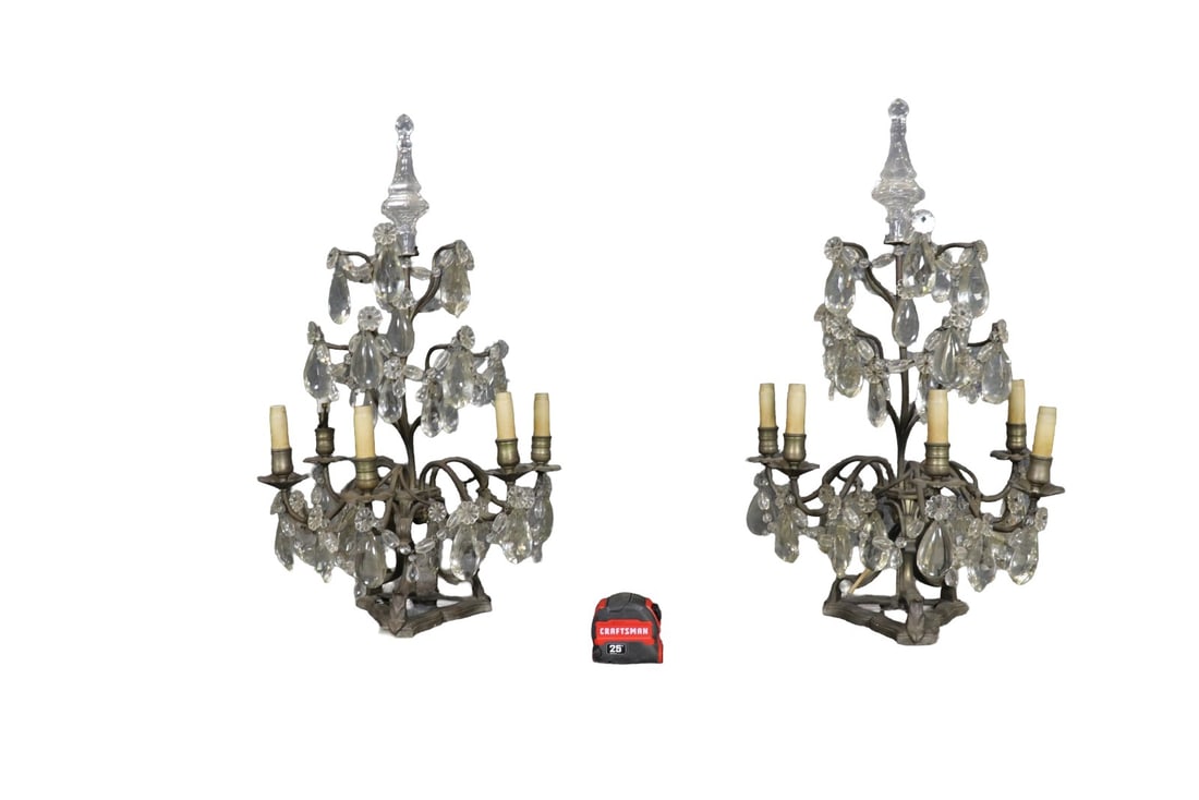 PAIR BAGUES STYLE IRON & CRYSTAL 5 ARM CANDELABRAS: Iron frames. Crystal prisms. 5 arms. 27 1/4" h x 15 1/2" w x 12 1/2" d.