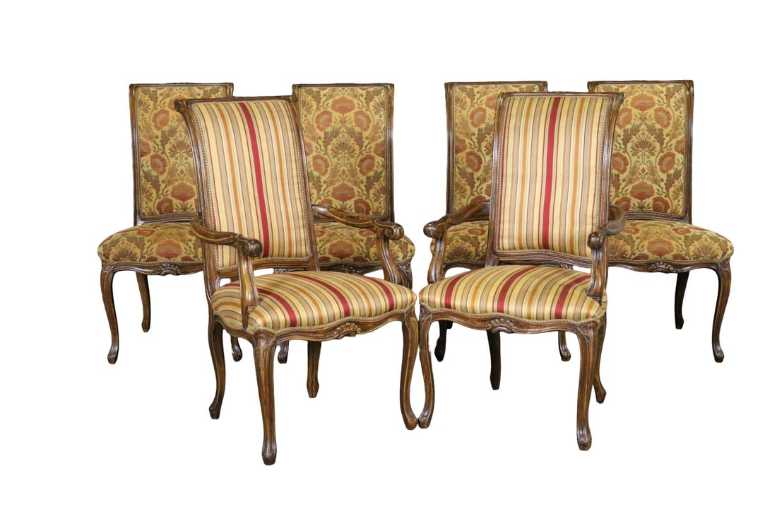 6 COUNTRY FRENCH LOUIS XV STYLE WALNUT DINING CHAIRS: Walnut frames. Upholstered back and seats. Carved. 2 side chairs measure 41 1/4" h x 22 3/8" w x 22" d. Seat height 19". 4 side chairs measure 41 1/4" h x 20 3/4" w x 20 1/4" d. Seat height 19".