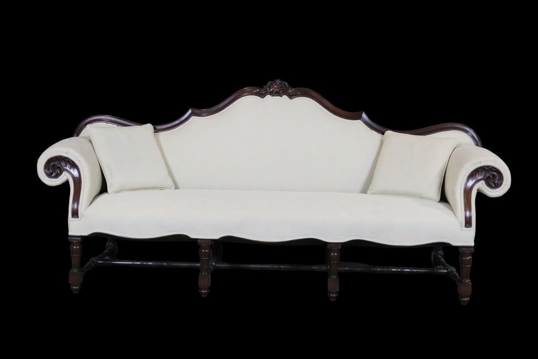 CONTINENTAL STYLE HUMP BACK SOFA: Carved wood frame. Hump back. Upholstered. 41 1/8" h x 91 1/4" w x 28" d. Seat height 18".