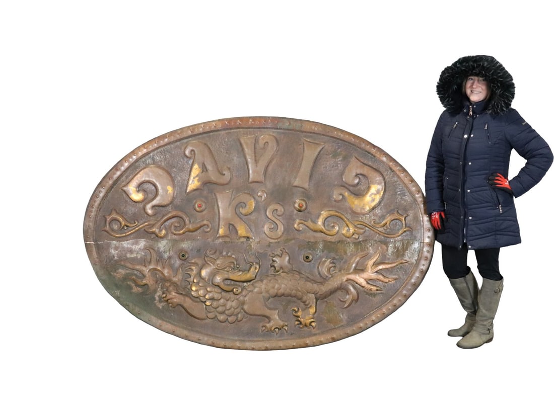 ART NOUVEAU COPPER OVAL SIGN OF DRAGONS: Copper wrap. On wood. Oval. 54 5/8" h x 82 3/4" w x 5 1/2" d.