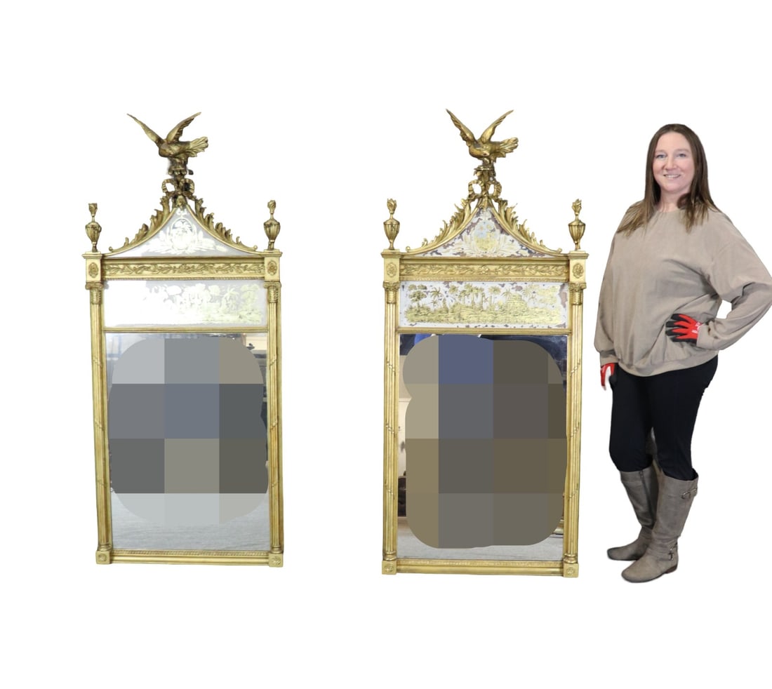 PAIR GOLD LEAF PAINTING ON GLASS EARLY AMERICAN MIRRORS: Gold leaf. Painting on glass. Eagle figural. Carved. 66 1/4" h x 28 7/8" w x 6 3/4" d.