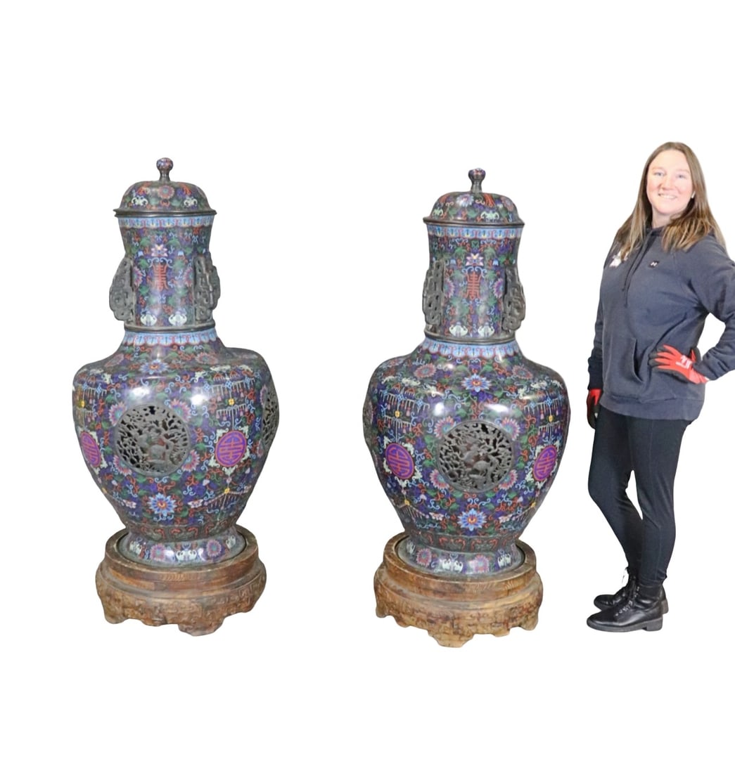 PAIR EARLY 19TH C CHINESE CLOSOINNE URNS WITH COVERS: 4 pieces. Sits on early carved wood bases. With covers. Metal. Enameled. 60 1/2" h x 24 1/2" diameter.