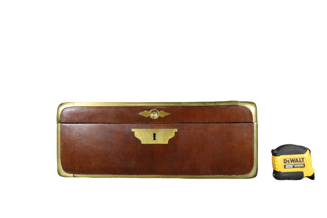 ENGLISH MAHOGANY TEA BOX: Mahogany. Brass accents. Lift up lid. 7" h x 18 1/4" w x 11 3/4" d.