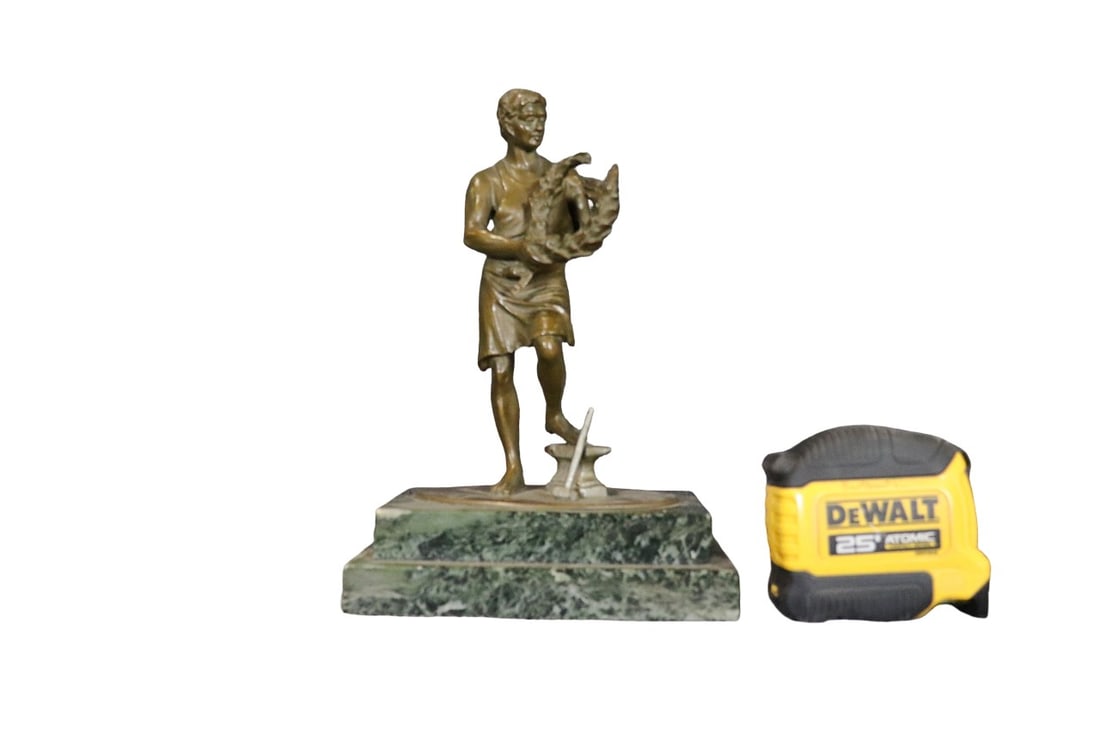 BRONZE STATUE ON MARBLE BASE: Bronze. Marble. 9" h x 6 1/2" w x 4 1/4" d.