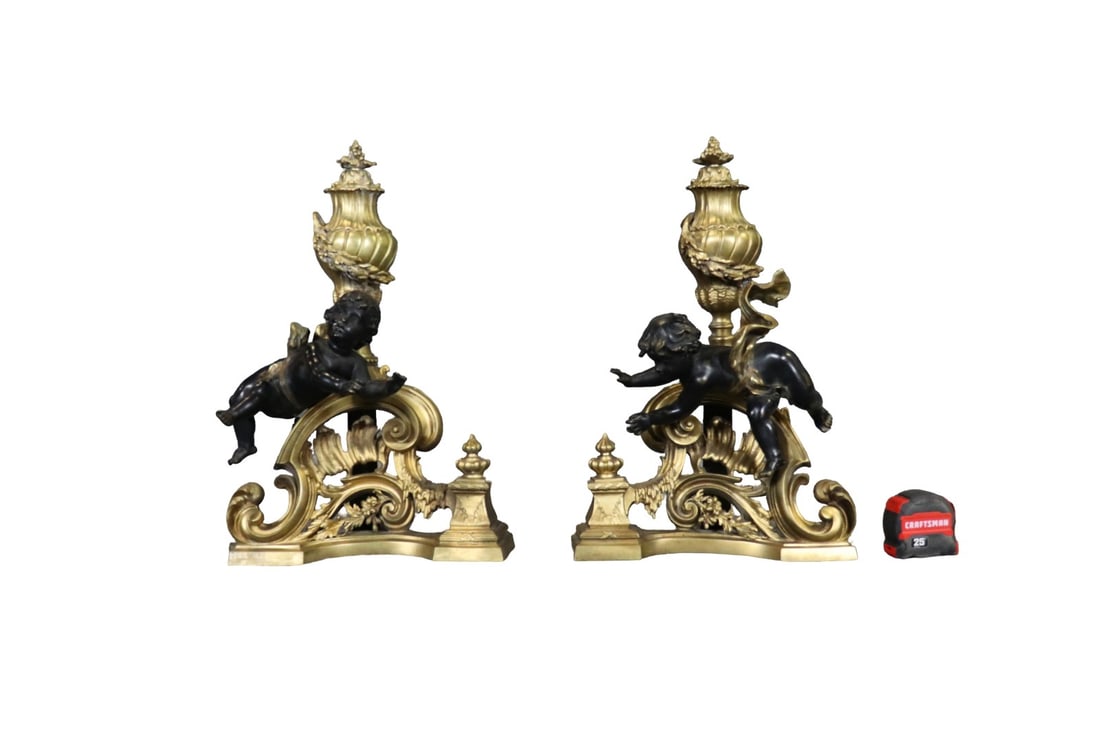 LARGE PAIR BRONZE ANDIRONS WITH 2 ANGEL FIGURES: Bronze. Angel figural. 21 1/4" h x 14" w x 12" d.