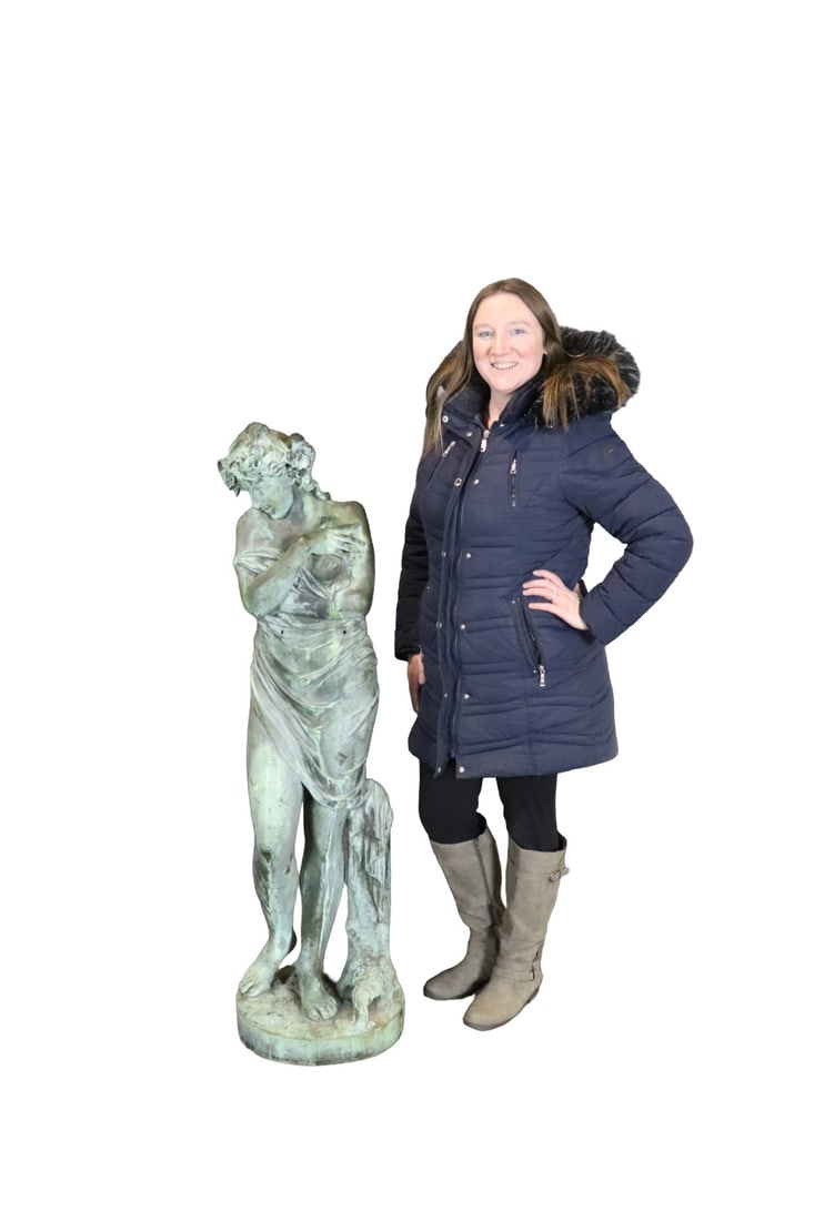 SIGNED LARGE BRONZE STATUE OF A WOMAN: Bronze. 2 piece. Illegibly signed on base. 53 1/4" h x 14" w x 13 1/2" d.