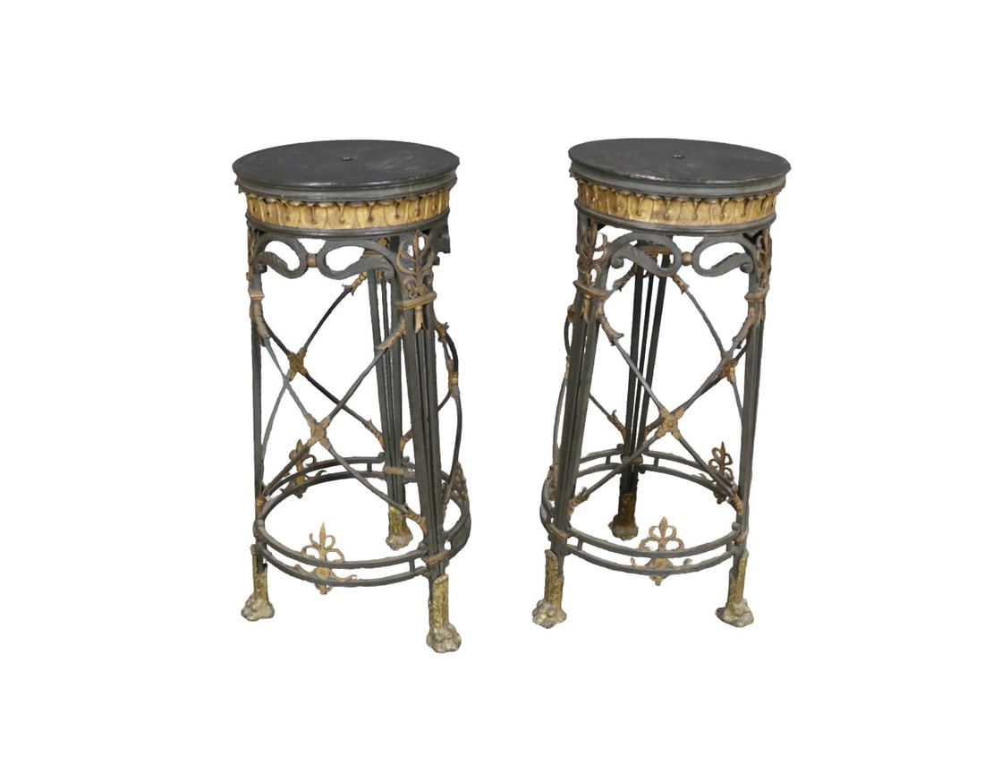 PAIR CAST IRON & BRASS STANDS: Cast iron. Brass. Claw feet. 34" h x 18" diameter.