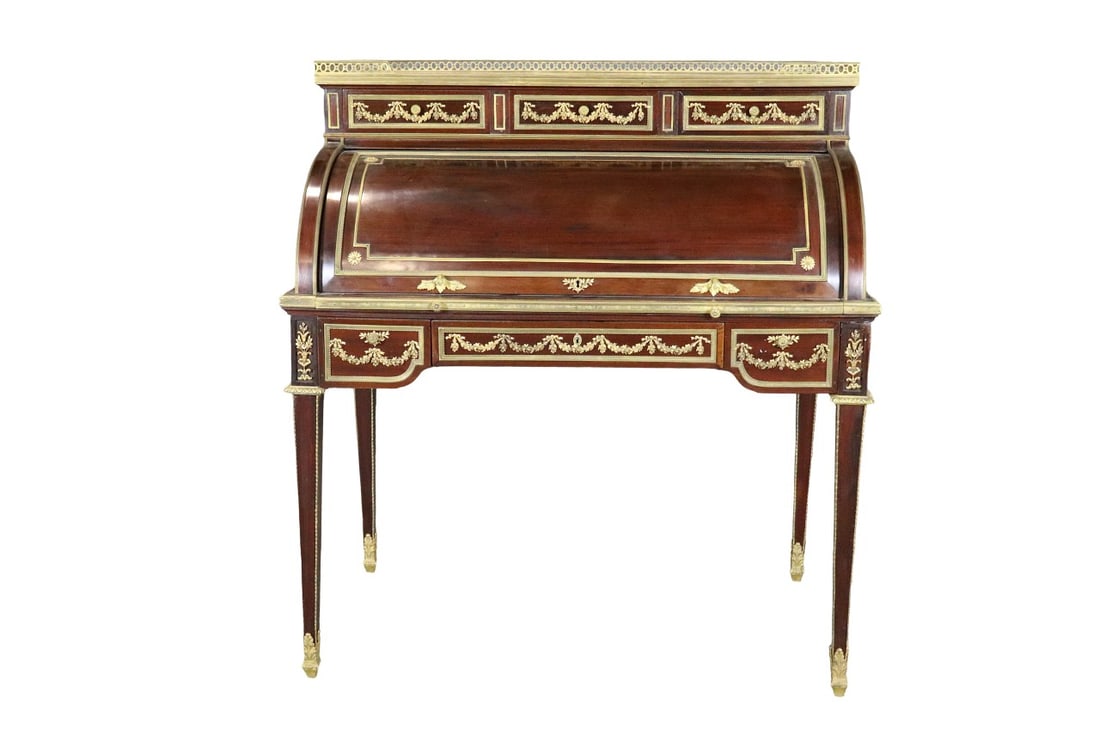 LOUIS XVI STYLE MARBLE TOP SATINWOOD BRONZE MOUNTED ROLL TOP DESK ATTRIBUTED TO LINKE: Marble top. Satinwood. Bronze mounted. Gallery top. 3 dovetailed drawers on top. Roll up top containing fitted interior. Pull out leather top writing area. 3 drawers on bottom. 45 1/8" h x 41 3/8" w x