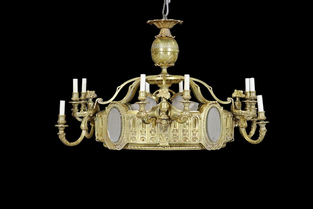 LARGE BRONZE & FROSTED GLASS RAM HEAD FIGURAL CHANDELIER: Bronze. Frost glass. Ram head figural. 12 arms. 4 lights on inside. Beveled glass frosted inserts. 24" h x 38" w x 28 3/4" d.