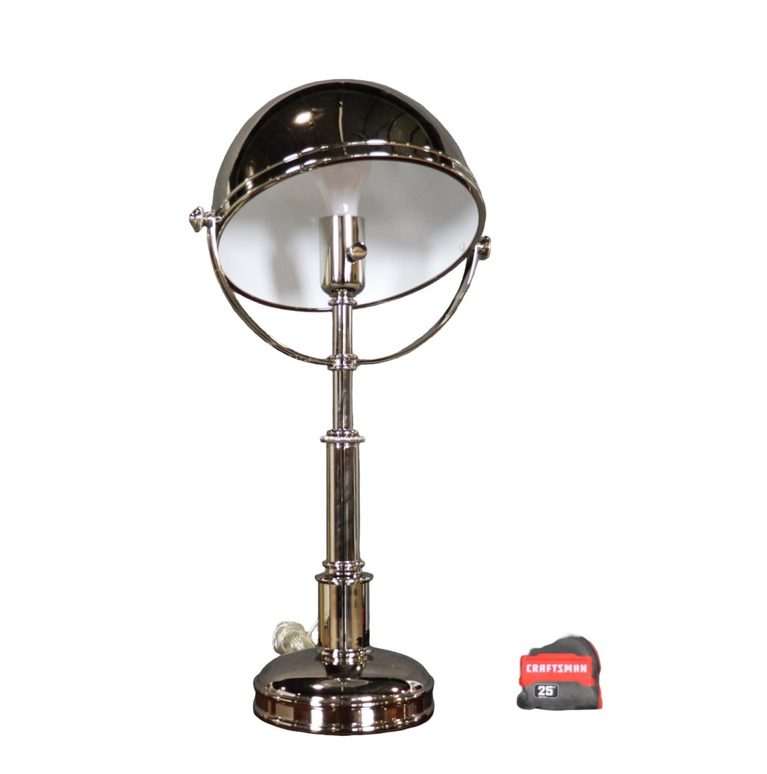 SIGNED RALPH LAUREN POLISHED NICKEL TABLE LAMP: Signed. Polished nickel. Adjustable. 22 3/4" h x 12 1/2" diameter.