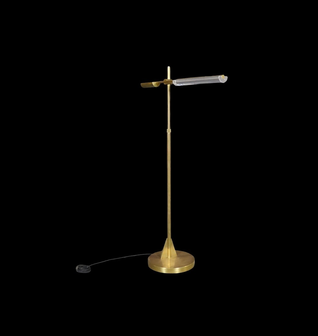 SIGNED RALPH LAUREN BRASS & ACRYLIC ADJUSTABLE FLOOR LAMP: Brass polished finish. Lucite. Adjustable. 46" h x 11" w x 26 1/2" d.