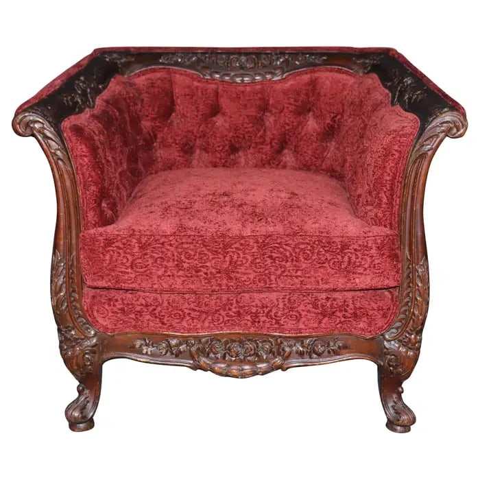 FRENCH LOUIS XV STYLE CARVED WALNUT SQUARE BACK BERGERE CHAIR: Carved walnut frame. Square back. Red textured upholstery. Tufted back. 30 1/4" h x 37" w x 29" d. Seat height 20".