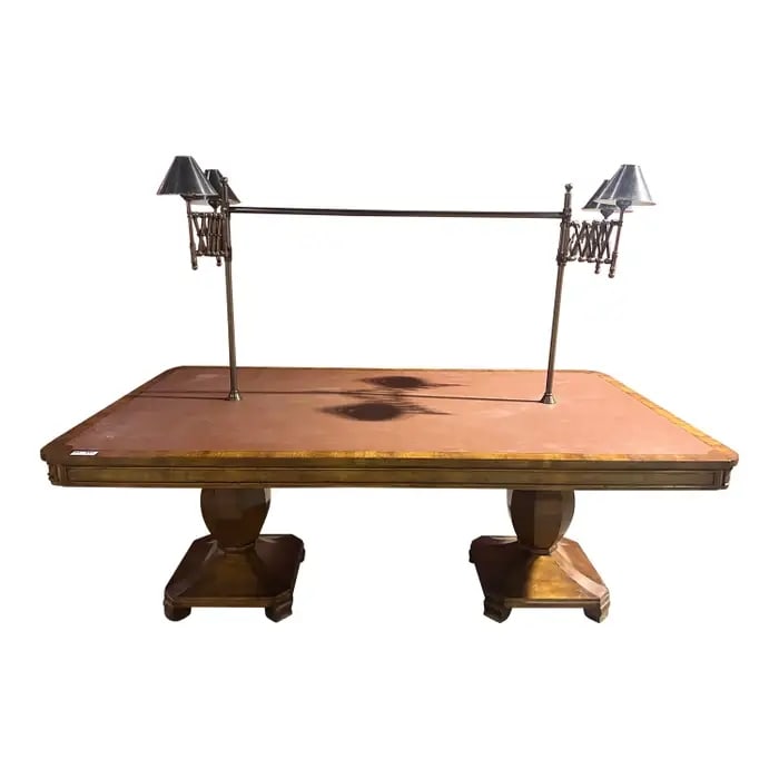 ENGLISH YEW WOOD LIBRARY TABLE: Yew wood. With accordion brass lamps. Leather inlay top. Lamps are adjustable. Sculpted legs. 66" h x 78" w x 45" d.