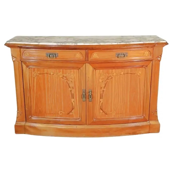 MAISON KRIEGER MARBLE TOP DIRECTOIRE SIDEBOARD: Carved. Marble top. Brass hardware. 2 dovetailed upper drawers. Two doors containing 1 shelf. 39 1/2" h x 62 3/4" w x 23 1/4" d.