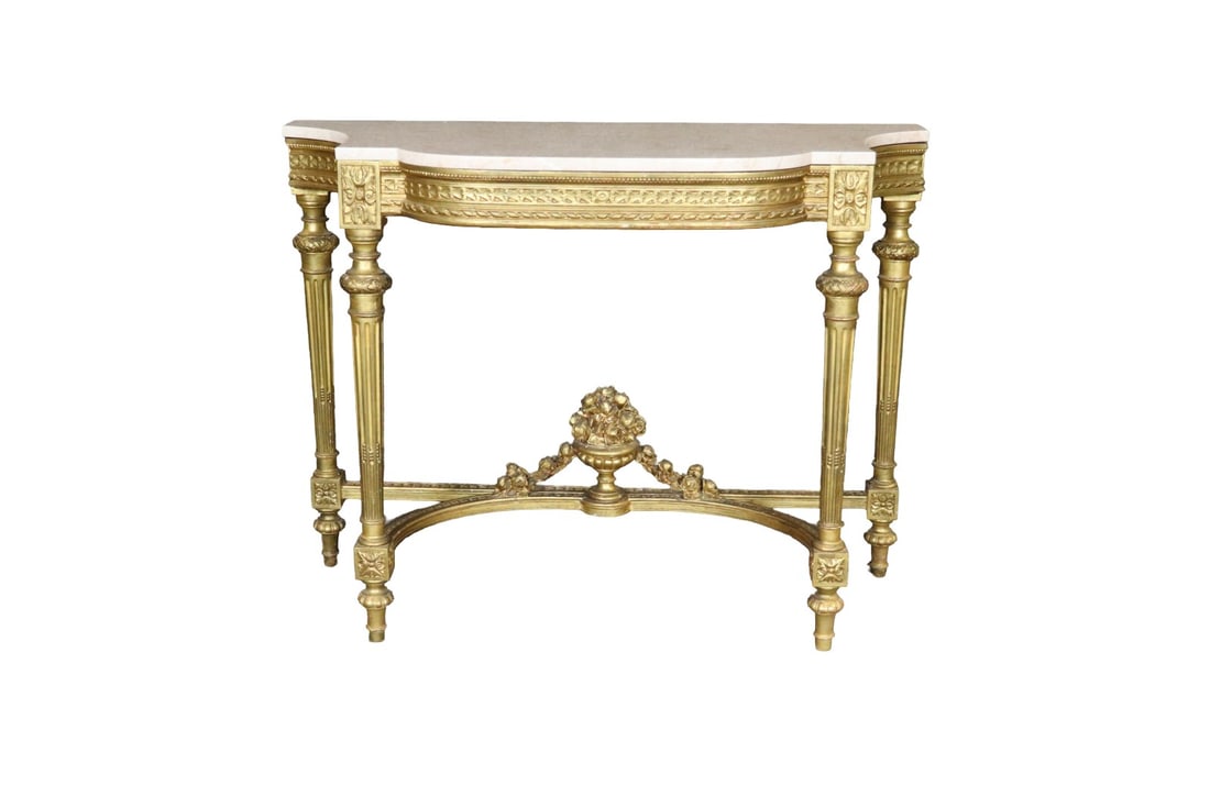 FRENCH LOUIS XVI STYLE CARVED GILTWOOD & MARBLE TOP CONSOLE: Carved giltwood frame. Marble top. 34 5/6" h x 45 1/4" w x 19 7/8" d.