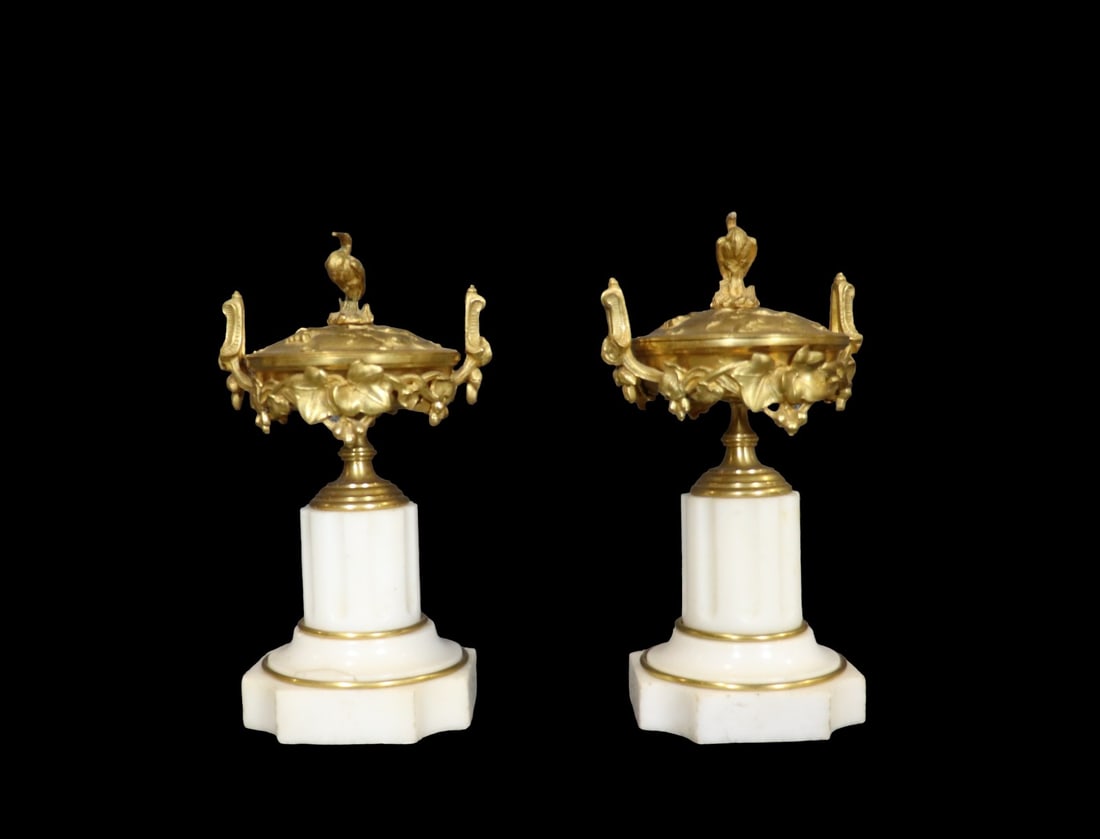 PAIR FRENCH NEOCLASSICAL STYLE GILT BRONZE & MARBLE LIDDED URNS: Gilt bronze. Marble. Figural. 10 1/2" h x 5 3/4" w x 4 3/4" d.