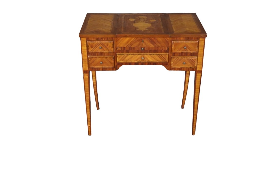 LOUIS XVI STYLE INLAID TABLE: 2 dovetailed drawers. 1 pull out drawer. Wood. Metal hardware. Inlaid. 28 1/2" h x 29 1/2" w x 17 1/4" d.