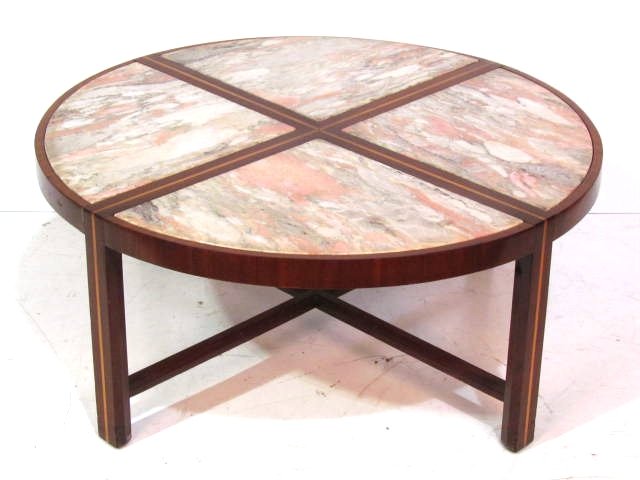 TOMMI PARZINGER CHARAK MARBLETOP COFFEE TABLE: Inlaid mahogany. Good condition. Various marks on wood. 17"h. x 13" diameter.