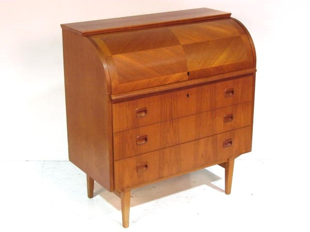 SCANDINAVIAN TEAK CYLINDER DESK: Very good condition. 38 1/4"h. x 35 1/2"w. x 18 1/2"d.