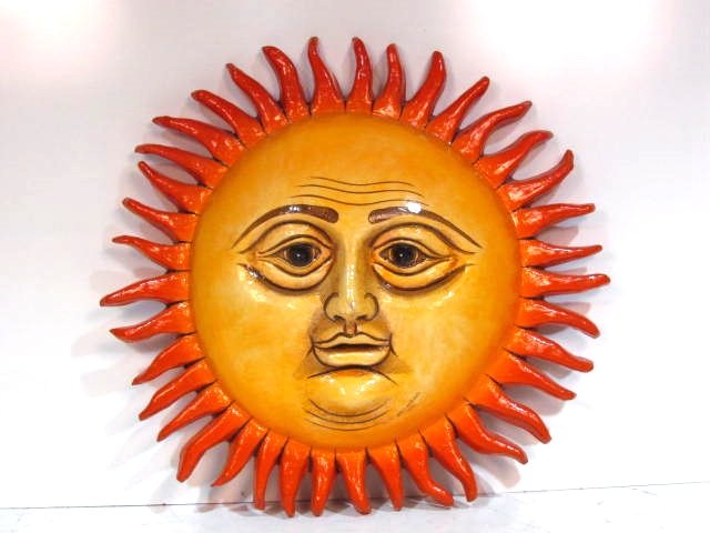SERGIO BUSTAMANTE 43" PAPER MACHE SUN SCULPTURE: Painted paper mache. Good condition. Damaged nose and various minor edge damages. 43" diameter.