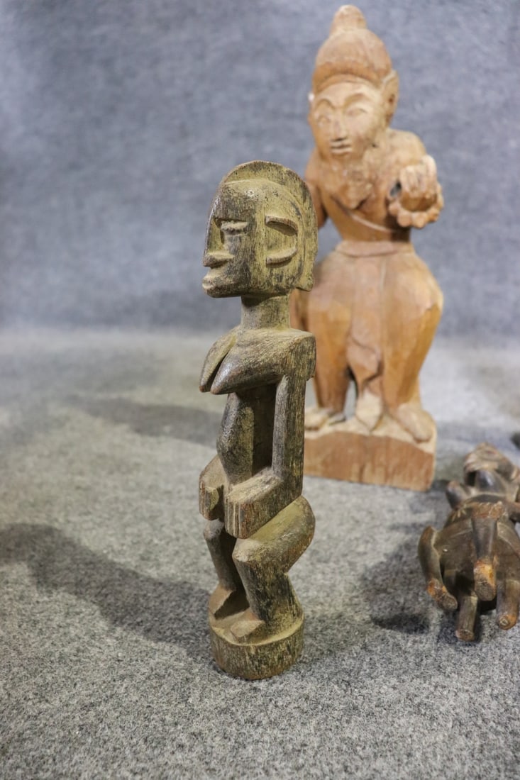 8 CARVED FIGURES - 3
