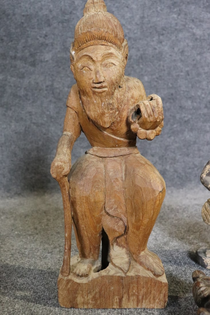 8 CARVED FIGURES - 4