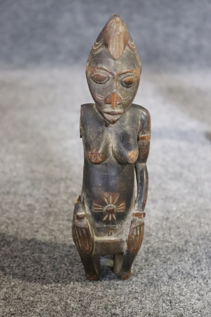 8 CARVED FIGURES - 7