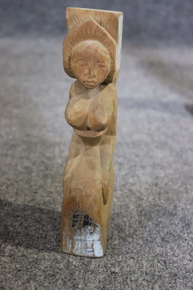 8 CARVED FIGURES - 9