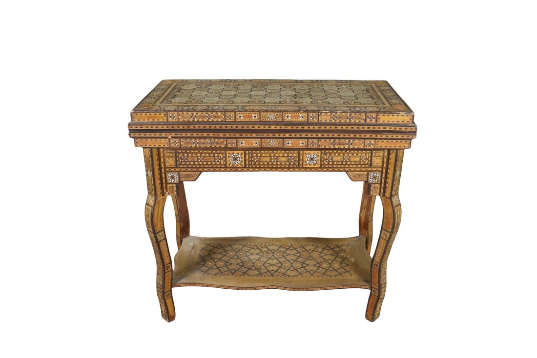 PERSIAN GAME TABLE: Mother of pearl inlay. Felt game top. Inlaid. Open measures 33 3/4" square. Closed measures 32" h x 34" w x 17 1/2" d.