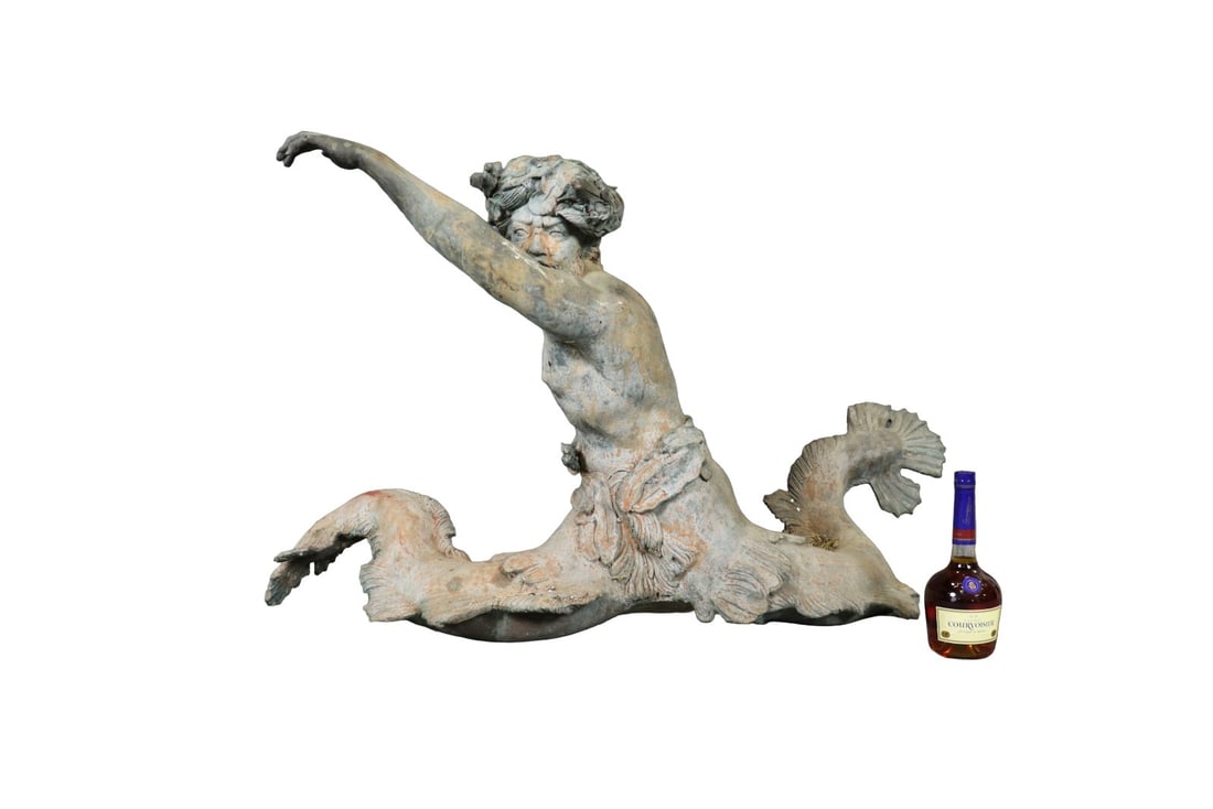 BRONZE FIGURAL SCULPTURE OF MERMAN: Bronze. 29" h x 51" w x 22" d.