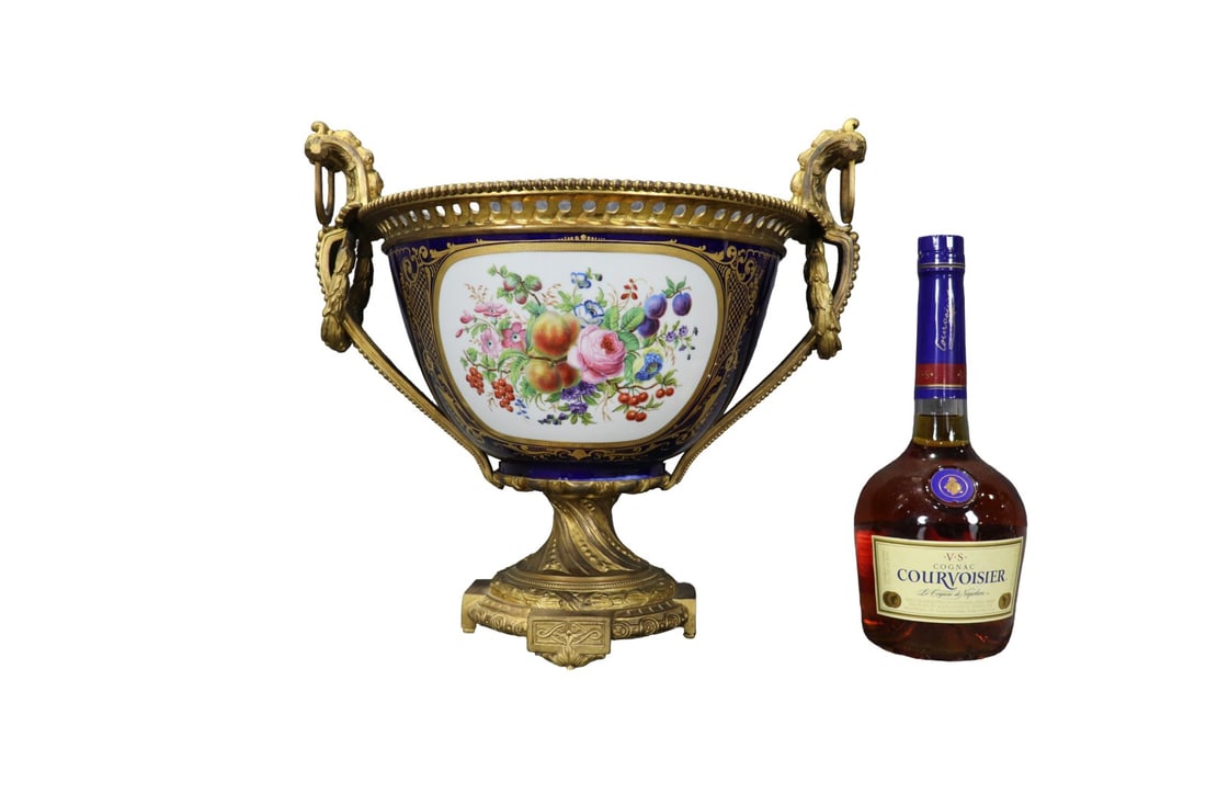 FRENCH SEVRES STYLE BRONZE MOUNTED PORCELAIN CENTERPIECE: Gilded bronze. Porcelain. Hand painted. 13 3/4" h x 14 1/2" w x 11 1/2" d.