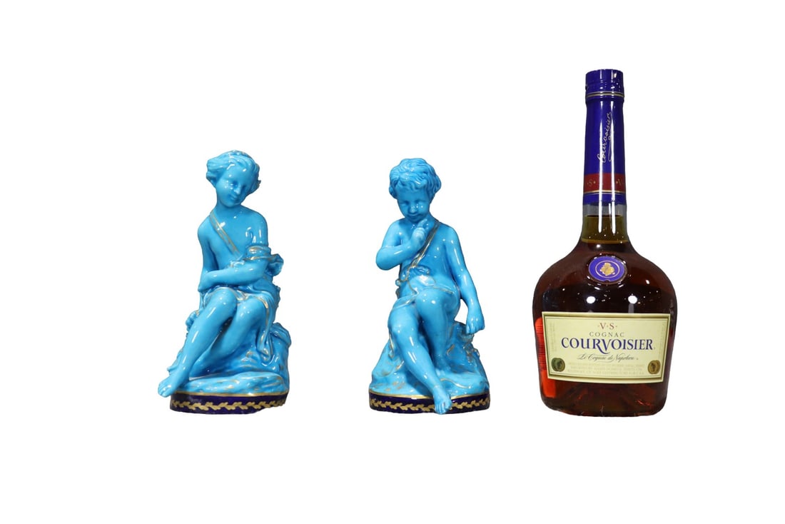 PAIR FRENCH SEVRES STYLE TURQUOISE GLAZED FIGURES: Turquoise glaze with gilt highlighting. Makers mark on bottom. C.F. on bottom. One measures 8" h x 3 3/4" w x 4 3/4" d. One measures 7 3/4" h x 4" w x 5 1/4" d.