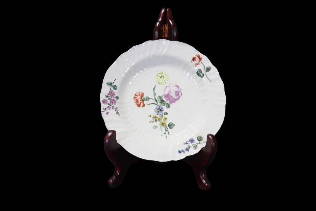 ANTIQUE PORCELAIN PLATE: Porcelain. Makers mark on bottom. L. Berknouff Collection sticker on bottom. 1 3/8" h x 9 3/8" diameter.