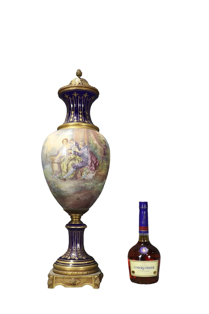 FRENCH SEVRES HAND PAINTED PORCELAIN VASE: Sevres mark on lid. 3 pieces. Hand painted. Porcelain. Gilt bronze. Illegibly signed on painting. 29 1/2" h x 10" diameter.