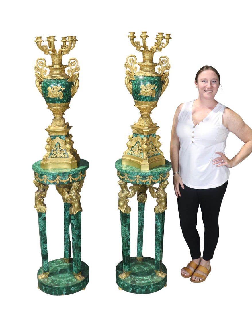 PAIR BRONZE MOUNTED MALACHITE CANDLEABRAS ON PEDESTALS: Figural. 2 pedestals. 2 bronze mounted palace malachite candelabras. 8 arms. Total measurement 72 1/4" h x 15 3/4"diameter. Candelabras measure 35 1/2" h x 12" w x 11" d. Pedestal measures 37" h x 15 