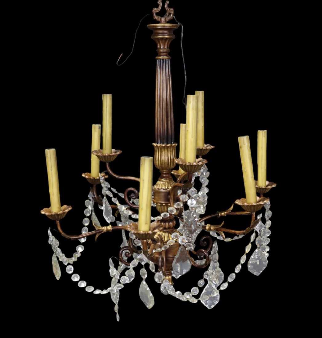 LOUIS XV STYLE CARVED WOOD & CRYSTAL CHANDELIER: Carved wood. Gilt. Metal mounts. 9 arms. 32 1/2" h x 30 1/2" diameter.