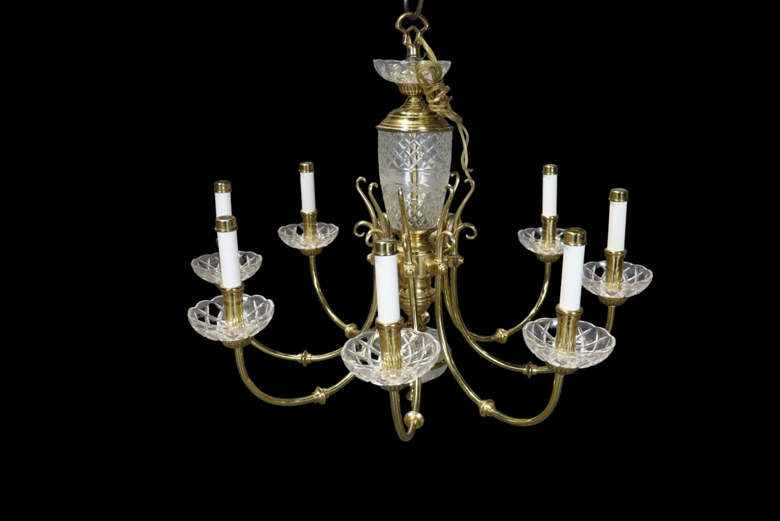 BRASS & CRYSTAL 8 ARM CHANDELIER: 8 arms. Mixed metals. Crystal. 20" h x 25 1/2" diameter.