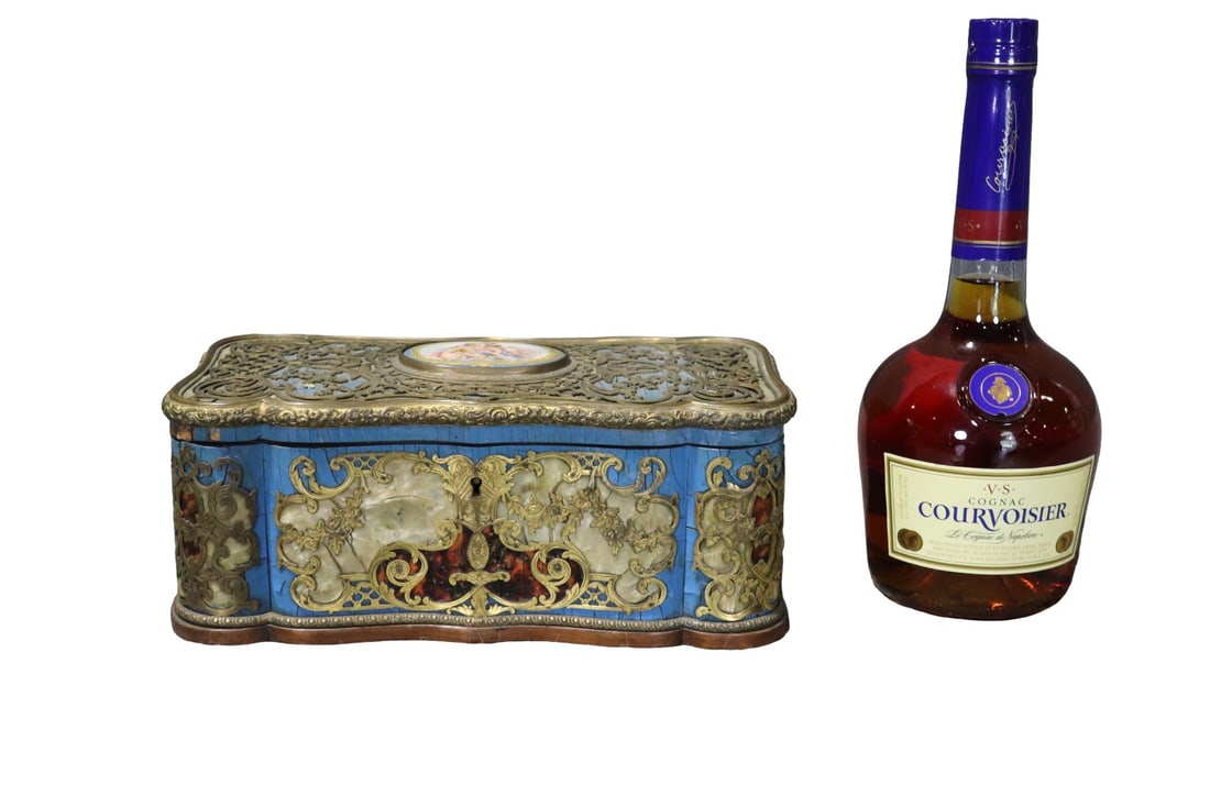 BRONZE & PAINTED PORCELAIN JEWELRY BOX: Bronze. Painted. Porcelain insert. Lined interior. Flip up lid. 4 1/4" h x 10 3/4" w x 5 1/4" d.
