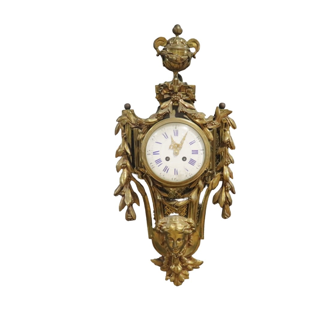 LOUIS XV STYLE BRONZE CARTEL CLOCK: Signed Ad. Mougin on back of movement. Bronze. Figural. 24" h x 11" w x 4" d.