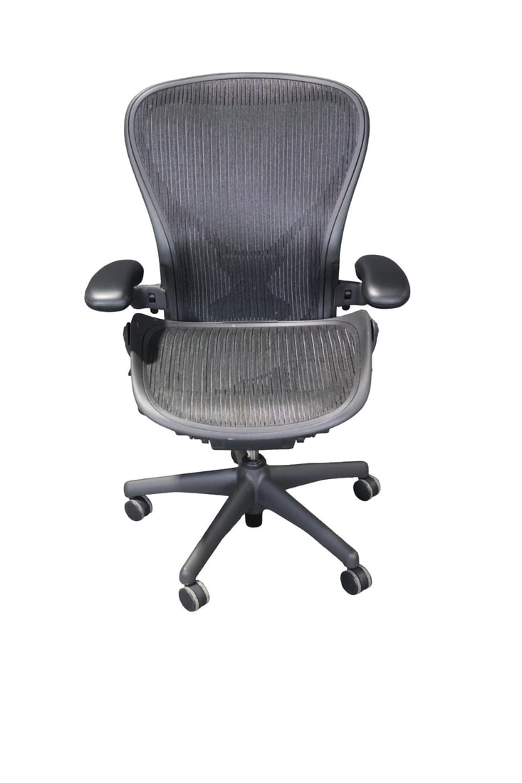 AERON CHAIR BY HERMAN MILLER: Herman Miller Aeron. Size C. Adjustable. 43" h x 26 1/2" diameter. 20 1/2" seat height.
