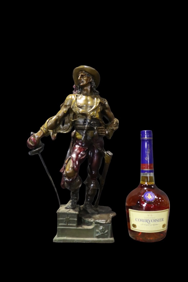 BRONZE FIGURE OF MAN WITH CANE: Bronze. 17 1/2" h x 8 1/2" w x 6 1/2" d.