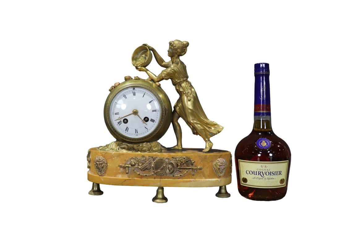 FIGURAL BRONZE & MARBLE CLOCK: Bronze. Marble. Stamped Made in France. 12" h x 11 1/4" w x 4 1/4" d.