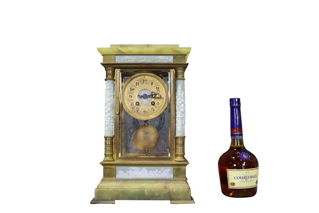 TIFFANY ALABASTER & PORCELAIN CLOCK: Signed Tiffany. Alabaster. Bronze mounts. 16" h x 10 1/4" w x 7 1/2" d.