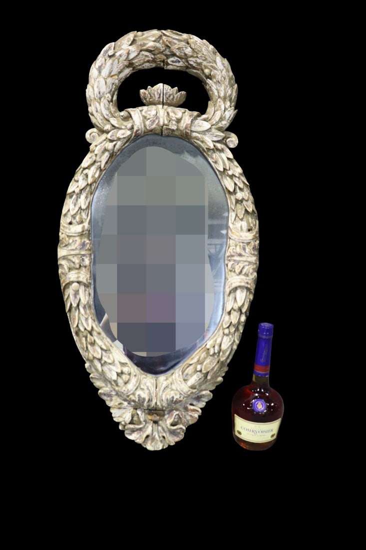 CARVED ANTIQUE PAINT DECORATED MIRROR: Carved. Painted. 33 1/4" h x 15 3/4" w x 1 1/2" d.