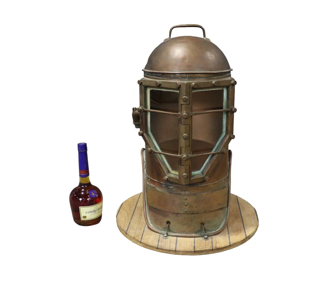 ANTIQUE SCUBA DIVER'S HELMET: Metal. Wood base. Glass. 25" h x 8 1/4" diameter.
