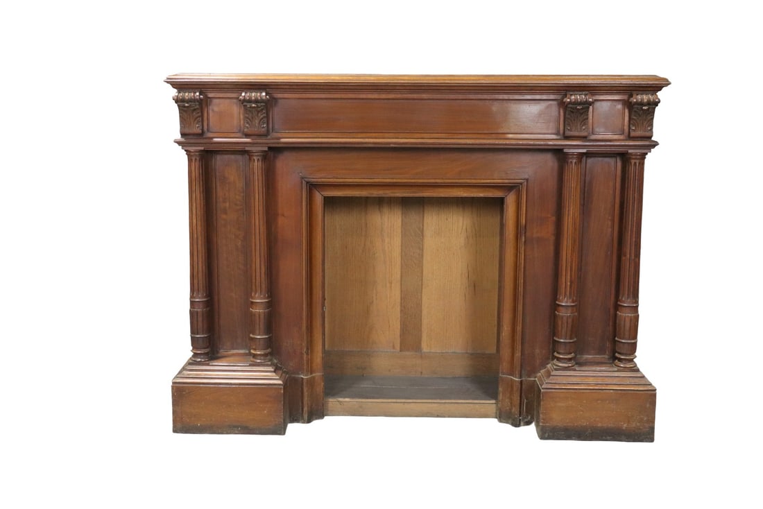 FRENCH CARVED WALNUT FIREPLACE MANTEL: Carved. Walnut. 47 1/4" h x 63" w x 19 7/8" d.