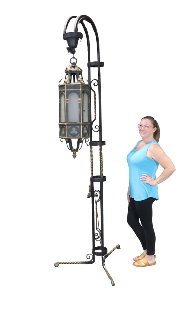 ENGLISH IRON FLOOR LAMP WITH SHADE: 2 pieces. Iron. Painted. Glass on lantern. 101 1/2" h x 32" w x 32" d.