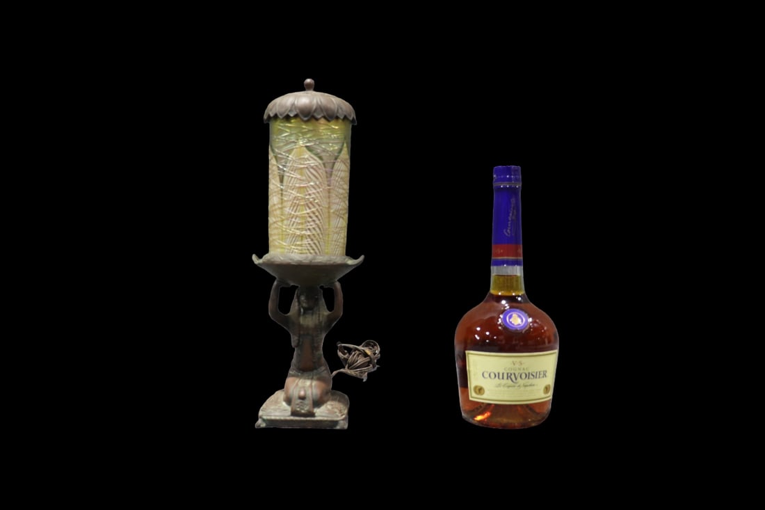 EGYPTIAN REVIVAL ART GLASS LAMP: White metal. Figural. Art glass. Removable top. 14 3/4" h x 5" w x 4 3/4" d.