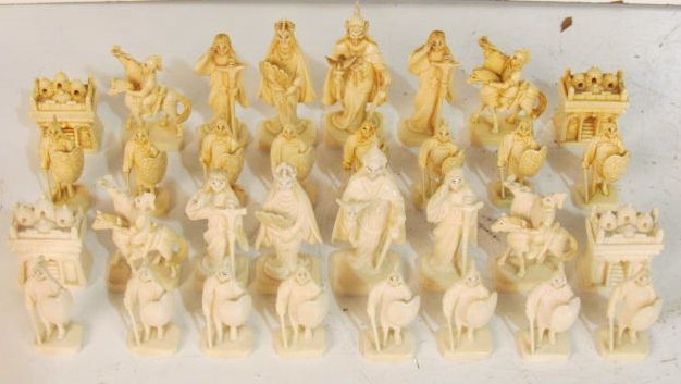 JAPANESE CARVED IVORY CHESS SET: 32 pcs. Very good condition. 2 1/4"h. to 3 1/2"h.